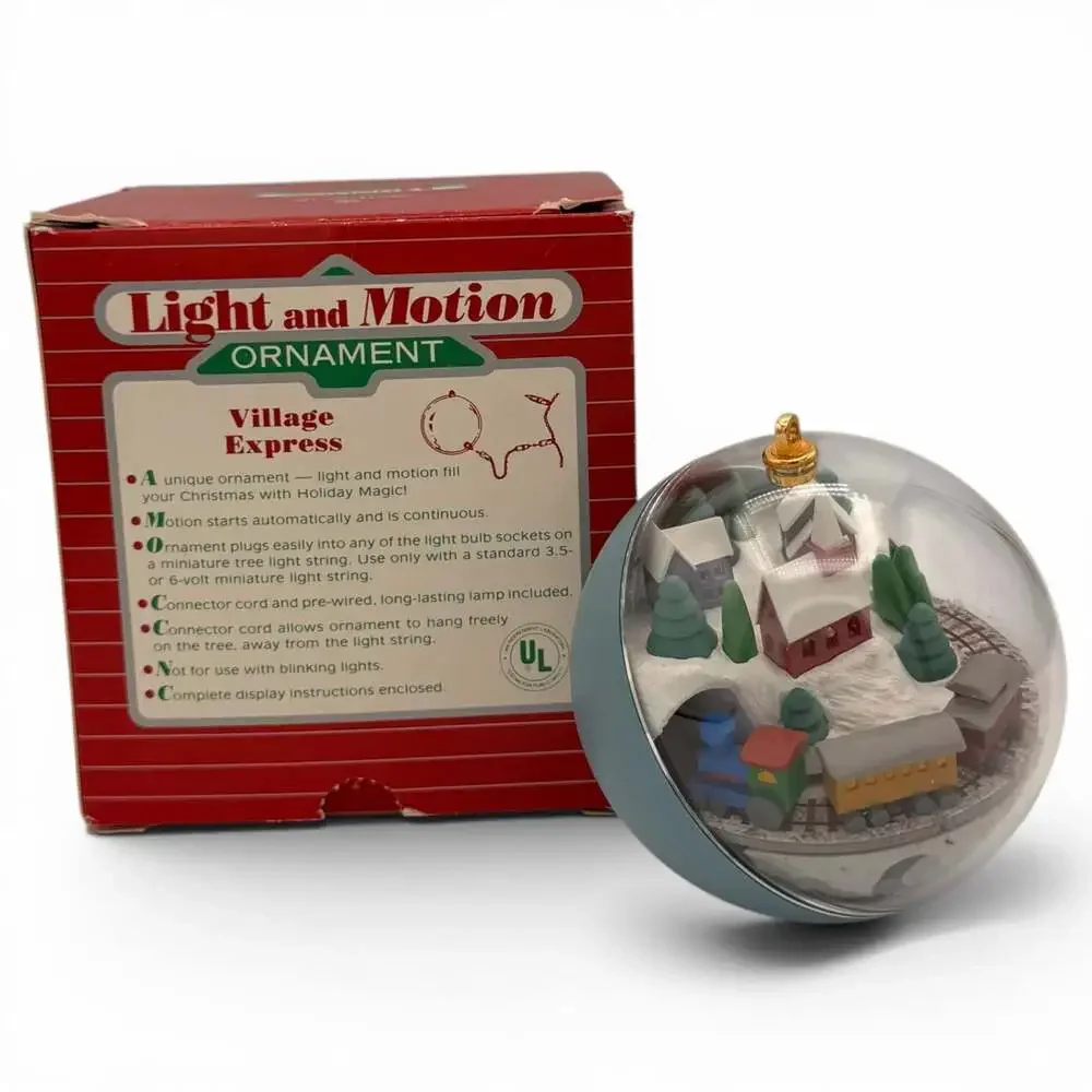 1986 Hallmark Keepsake Light and Motion Village Express Ornament